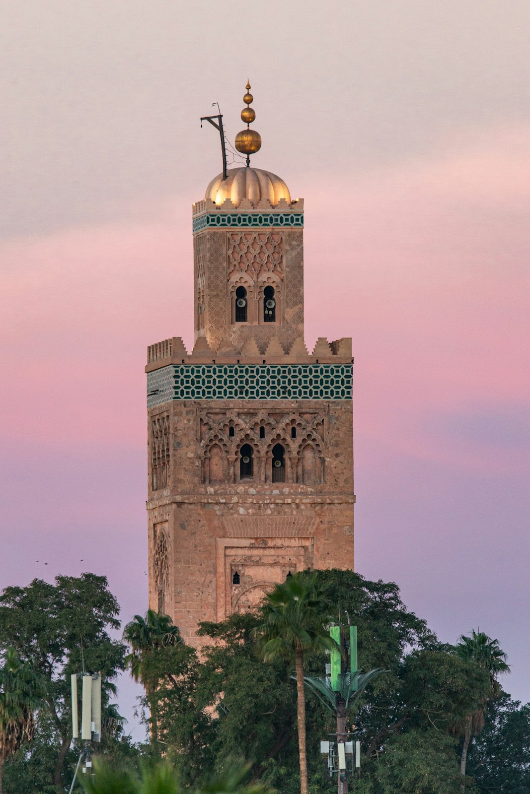 A tall tower with a clock on top of it
