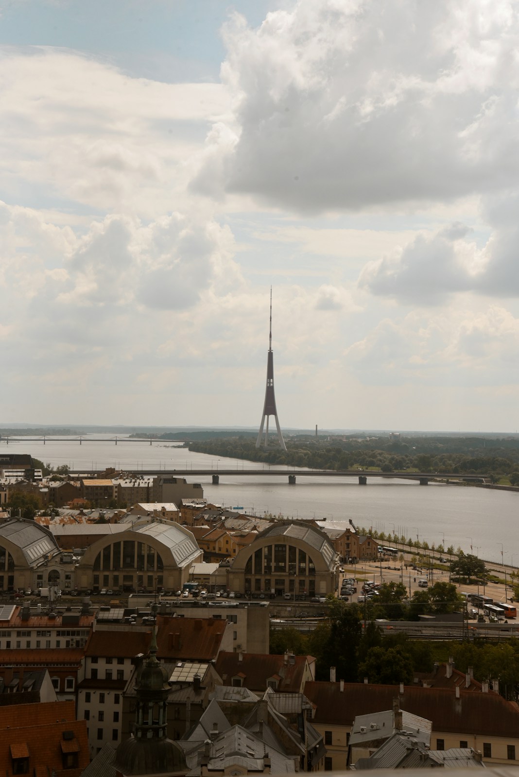 Cityscape with a tall tower and river